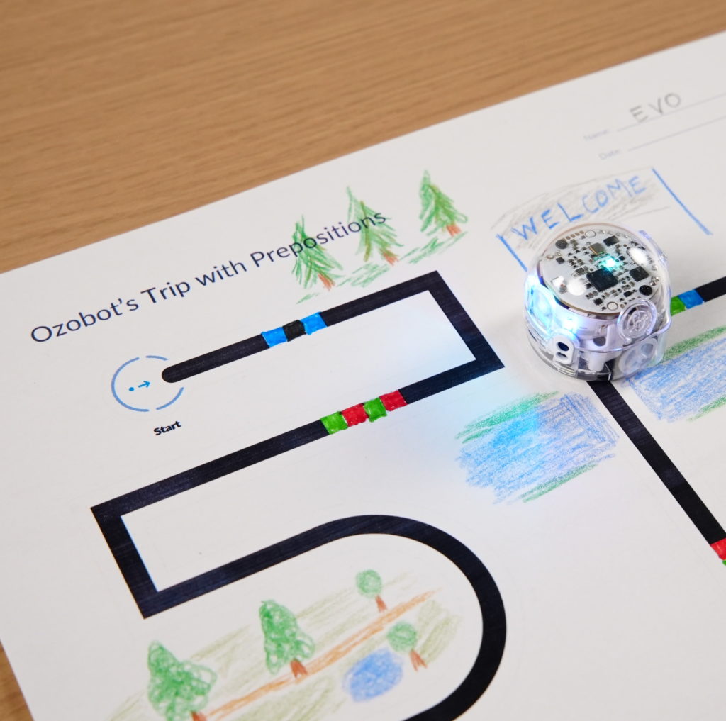 A picture of Ozobot's Trip with Prepositions STEAM activity for July Lesson Spotlight 2024