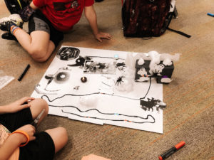 First graders learn how to code on paper with Ozobot