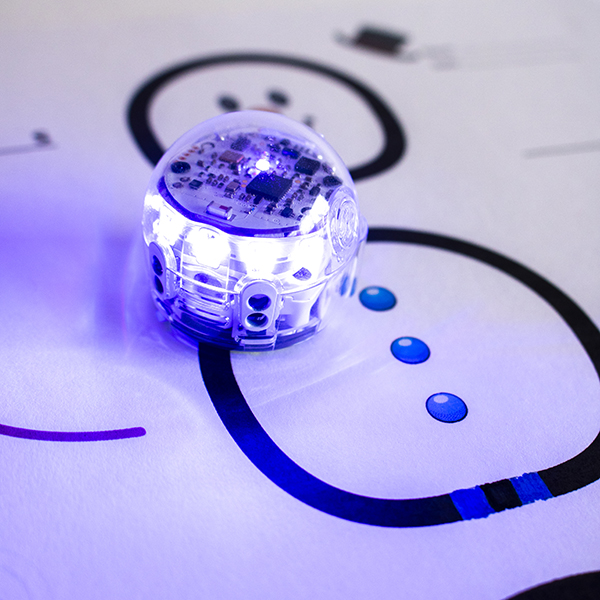 January Lesson Spotlight 2024: Evo coding robot follows color code outline of a snowman to practice skip counting