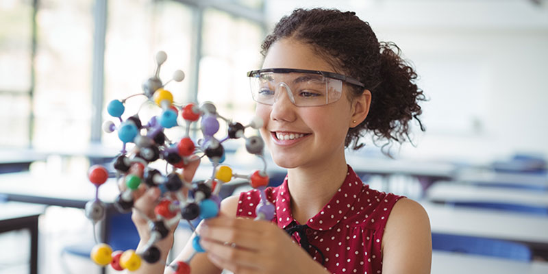 A female student in the science lab
