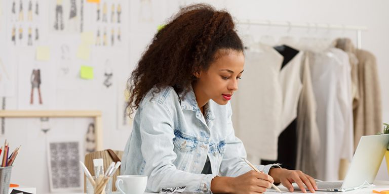A young fashion designer at work