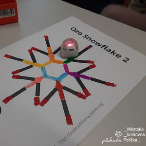 July Lesson Spotlight 2023: a colored, hand drawn snowflake. A coloring STEAM activity for beginners