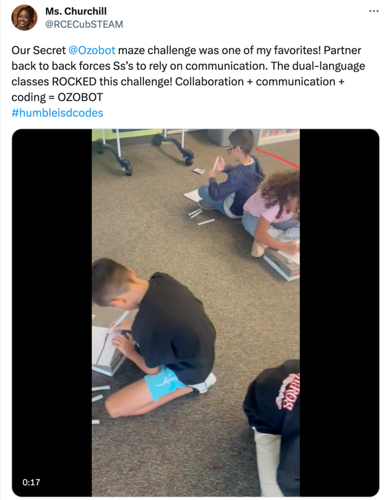 An image showing students collaborating to create their own mazes for Evo