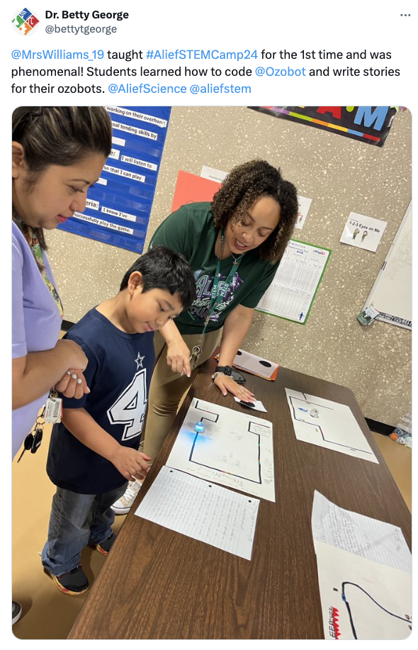 A picture of students and educators and Alief Science Summer STEM Camp where kids are taught to code